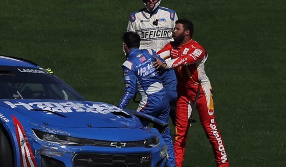 Bubba Wallace shoves Kyle Larson after an on-track incident during a race at Las Vegas Motor Speedway on Sunday in Las Vegas.
