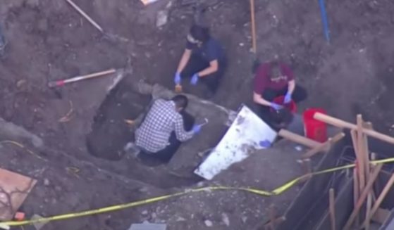 Landscapers working in the backyard of an affluent San Francisco Bay area community found a car buried in the backyard Thursday. Police cadaver dogs indicated the possible presence of human remains.