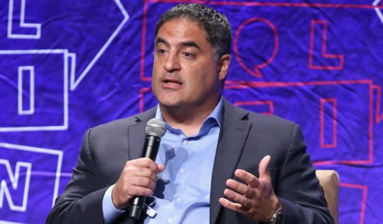 Cenk Uygur speaks onstage during Politicon in Los Angeles in a file photo from 2018.