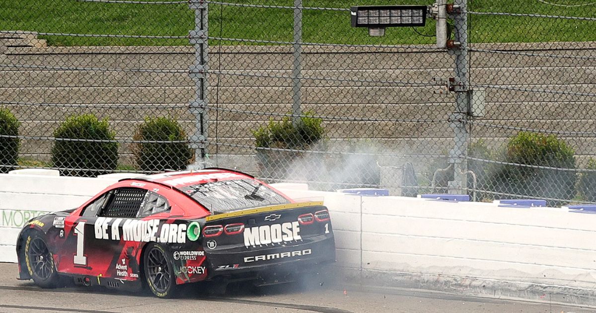 Ross Chastain rides the wall in the No. 1 Moose Fraternity Chevrolet on the final lap of the NASCAR Cup Series Xfinity 500 at Martinsville Speedway in Martinsville, Virginia, on Sunday.