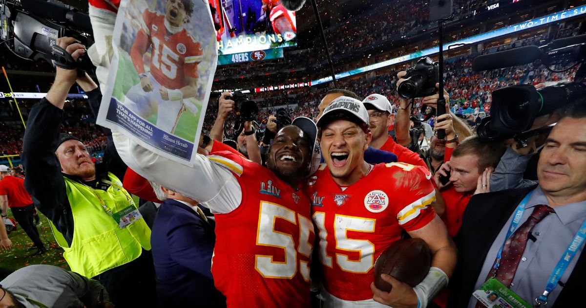 Defensive end Frank Clark, left, and quarterback Patrick Mahomes of the Kansas City Chiefs celebrate after defeating San Francisco 49ers 31-20 in Super Bowl LIV at Hard Rock Stadium in Miami on Feb. 2, 2020.