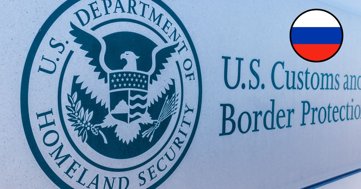 The U.S. Department of Homeland Security logo and Russian flag are seen in this stock image.