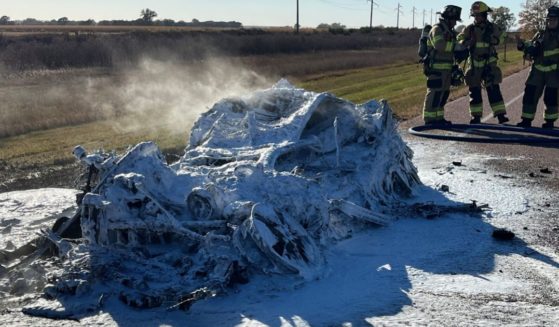 An electric car caught on fire on a highway near Vermillion, South Dakota, on Thursday, requiring firefighters to spend 2 hours and 17 minutes at the scene and leaving the car unrecognizable.