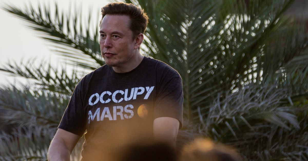 Elon Musk speaks on Aug. 25 in Boca Chica Beach, Texas.