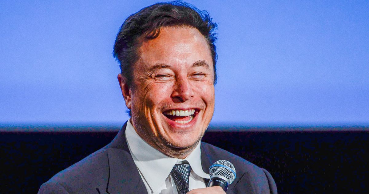 Elon Musk smiles as he addresses guests at the Offshore Northern Seas meeting in Stavanger, Norway on Aug. 29.