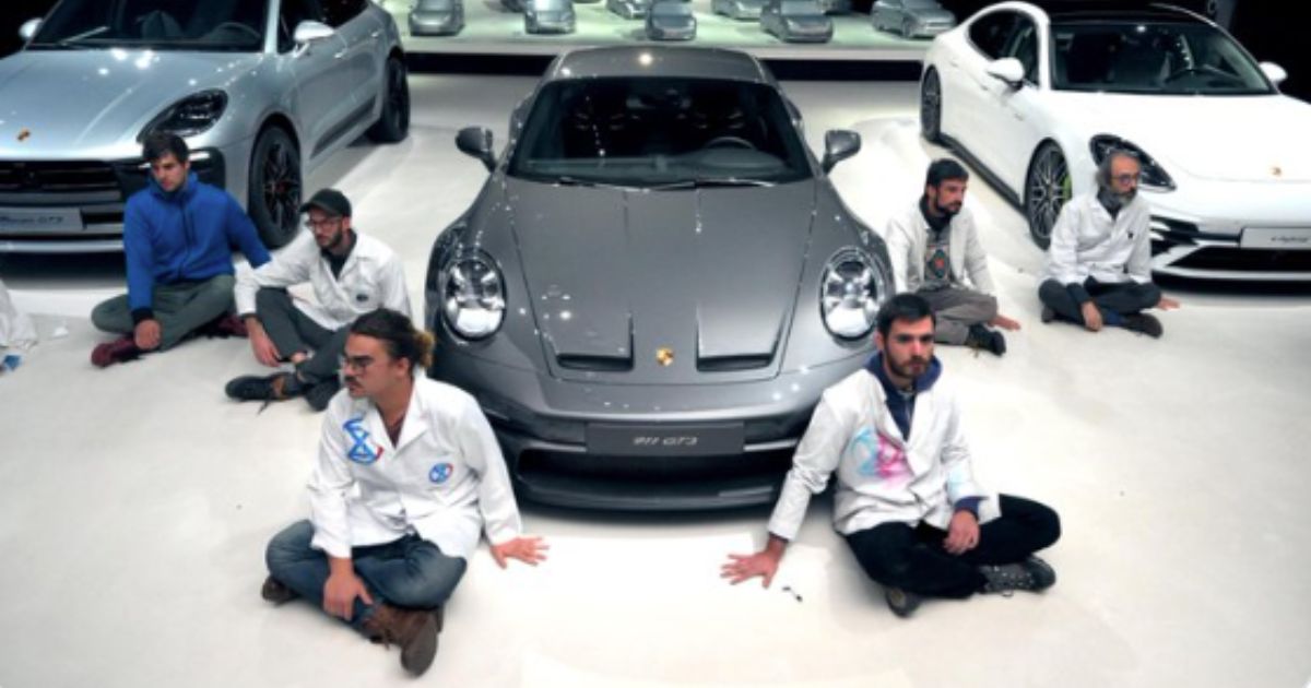 On Wednesday, nine green energy activists glued themselves to the floor of the Porsche pavilion at the Autostadt in Wolfsburg, Germany, demanding the German transport sector decarbonize.