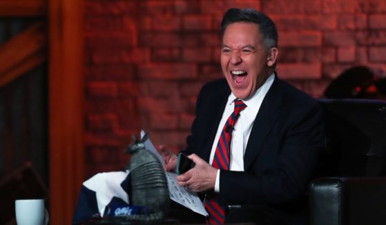 Greg Gutfeld laughs during taping of a Fox News Channel's "Gutfeld!" episode in a file photo from February.