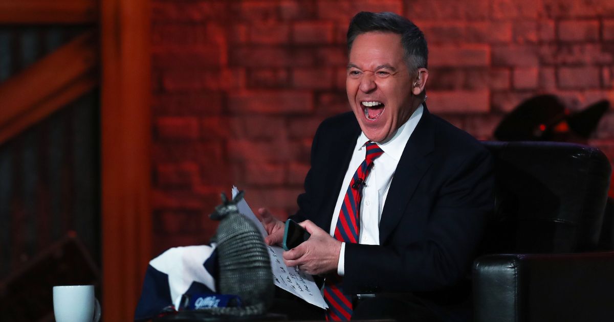 Greg Gutfeld laughs during taping of a Fox News Channel's "Gutfeld!" episode in a file photo from February.