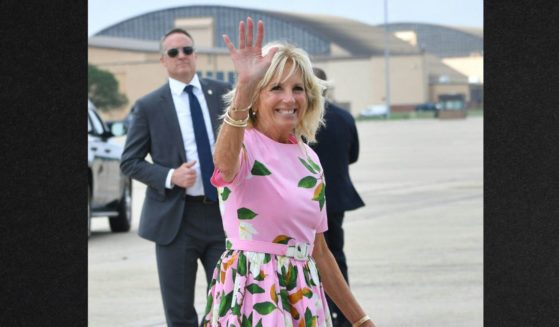 First lady Jill Biden waves before boarding Air Force One to depart Joint Base Andrews in Maryland in August.