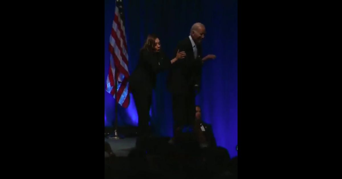 President Joe Biden appeared ready to walk off the edge of a stage as he and Vice President Kamala Harris appeared in Philadelphia on Friday.