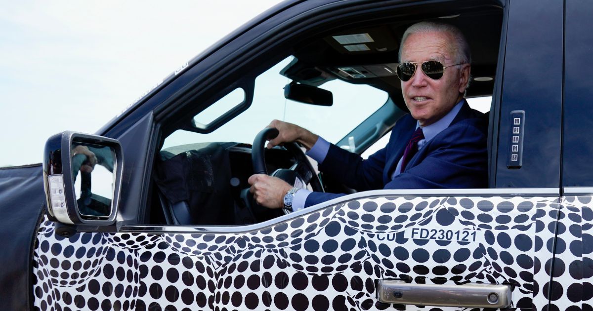 President Joe Biden drives a Ford F-150 Lightning