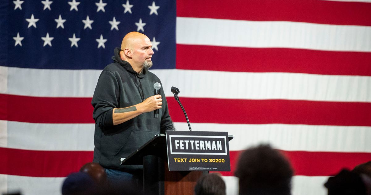 Democratic Senate candidate John Fetterman speaks during a rally on Aug. 12 in Erie, Pennsylvania.