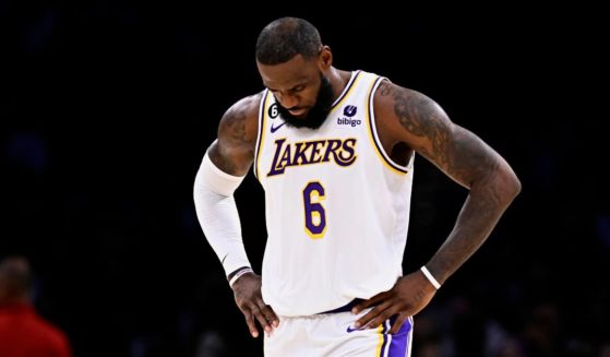 Los Angeles Lakers forward LeBron James walks off the court during a timeout in the first half of a home game against the Portland on Sunday.
