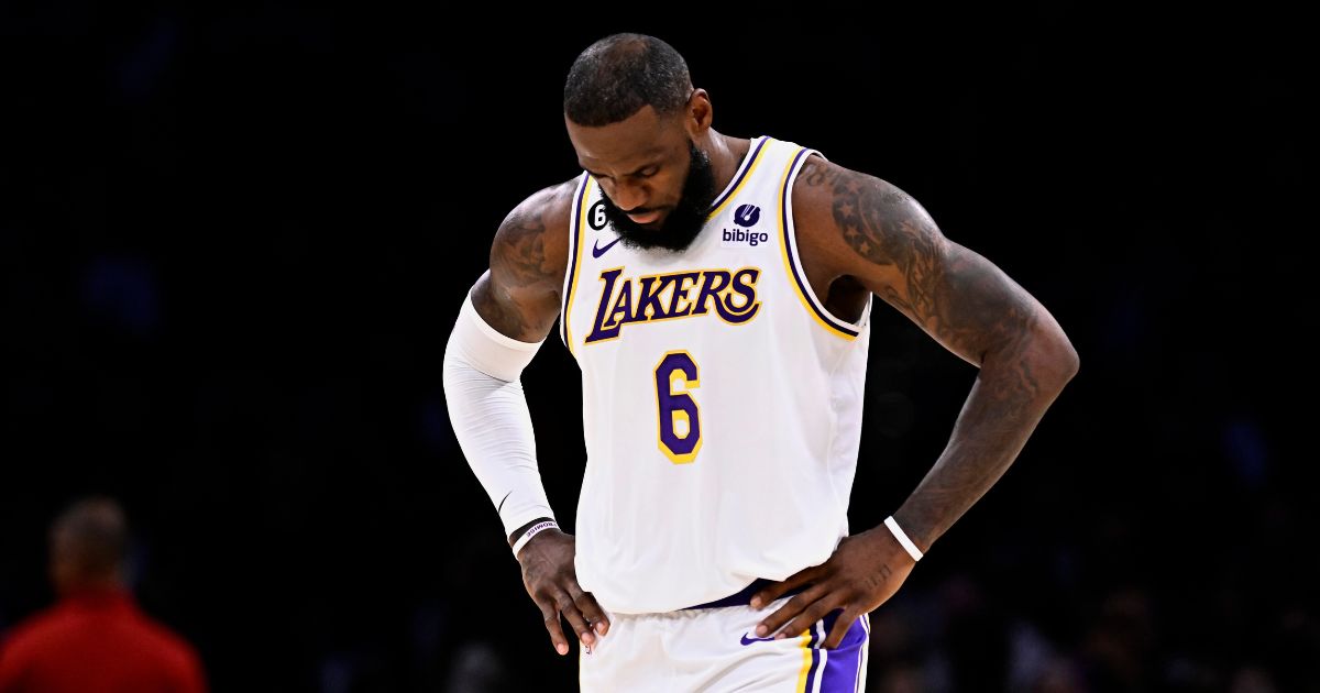 Los Angeles Lakers forward LeBron James walks off the court during a timeout in the first half of a home game against the Portland on Sunday.