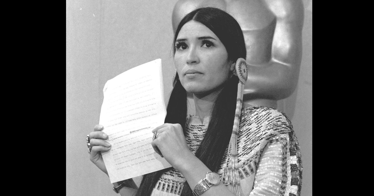 Sacheen Littlefeather, a Native American activist, tells the audience at the Academy Awards ceremony in Los Angeles on March 27, 1973, that Marlon Brando was declining to accept his Oscar as best actor for his role in "The Godfather."