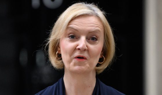 British Minister Liz Truss announces her resignation as she addresses the media outside No. 10 Downing Street in London on Thursday.