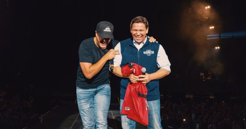 Country star Luke Bryan responded to criticism for inviting Florida Gov. Ron DeSantis onstage during a concert in Jacksonville on Friday.
