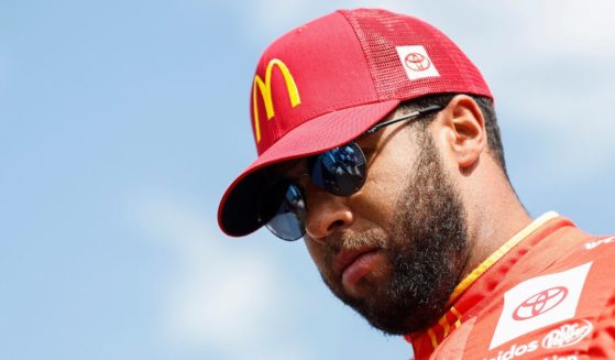 Bubba Wallace, driver of the #45 McDonald's Toyota, walks onstage during driver intros prior to the NASCAR Cup Series South Point 400 at Las Vegas Motor Speedway on October 16, 2022 in Las Vegas, Nevada.