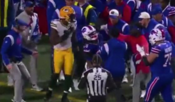 Green Bay Packers rookie linebacker Quay Walker shoved a member of the Buffalo Bills team after making a tackle on their sidelines, causing him to be ejected from Sunday night's game.