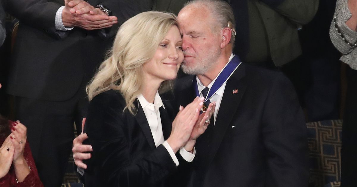 Rush Limbaugh embraces his wife Kathryn Adams Limbaugh after receiving the Presidential Medal of Freedom during the State of the Union address in the chamber of the U.S. House of Representatives on Feb. 4, 2020, in Washington, D.C.
