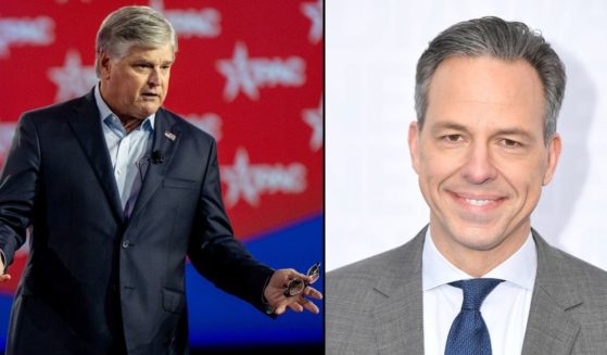 Sean Hannity, left, speaks at the Conservative Political Action Conference on Aug. 4 in Dallas, Texas. Jake Tapper poses on May 15, 2019, in New York City.