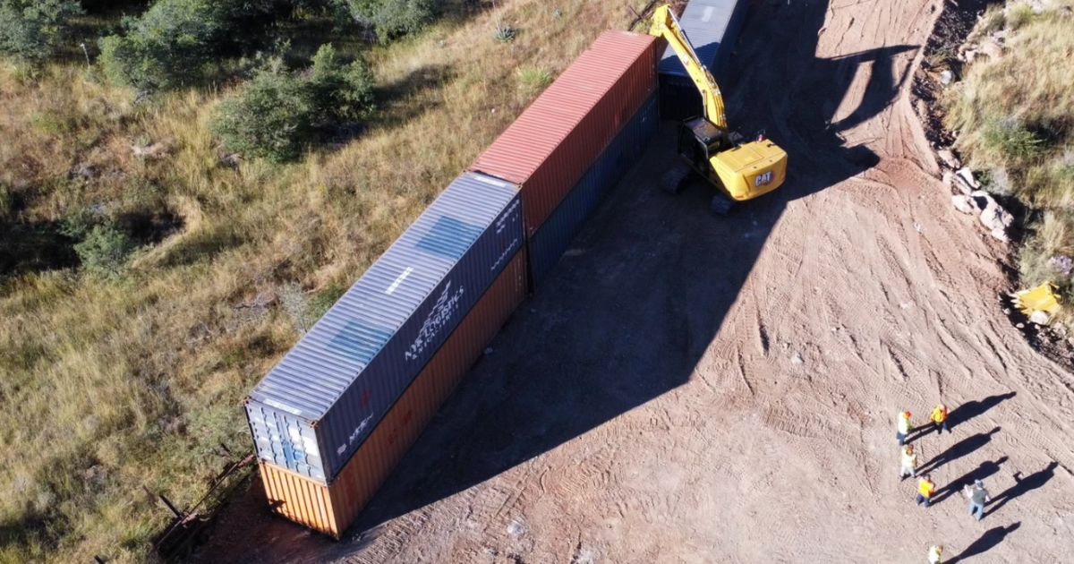 The state of Arizona resumed placing a barrier of shipping containers on the U.S.-Mexico border near Yuma this week.