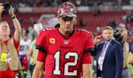 Tampa Bay Buccaneers quarterback Tom Brady walks off the field after a 27-22 loss to the Baltimore Ravens on Thursday night at Raymond James Stadium.