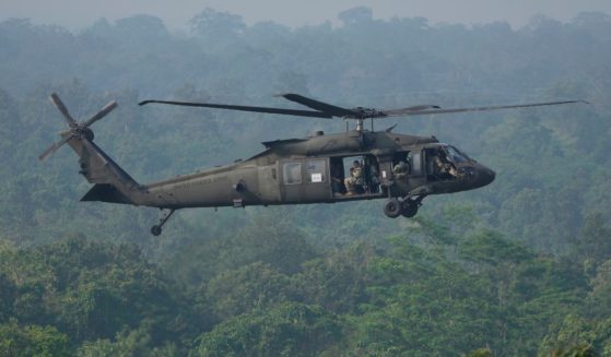 a U.S. Army Blackhawk helicopter flying