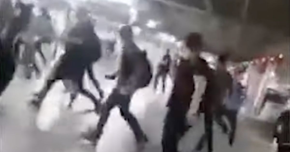 According to reports, students in the parking lot of Sharif University of Technology in Tehran, Iran, were attacked by "motorcyclists and plainclothes forces" during protests on campus on Sunday.