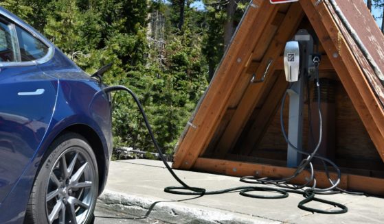 A Tesla at a charging station at Crater Lake National Park in Oregon.
