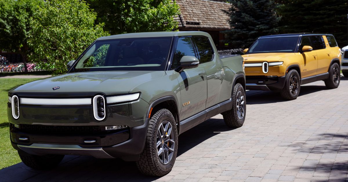 A Rivian R1T Truck and R1S SUV are pictured outside a conference in July in Sun Valley, Idaho.