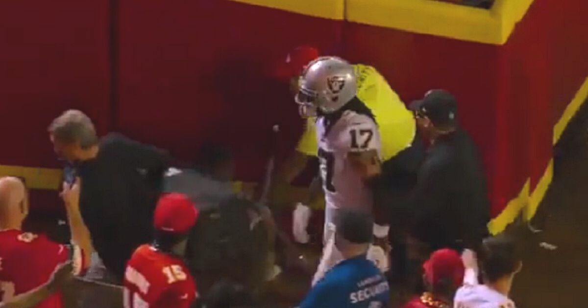 Las Vegas Raiders star receiver Davante Adams stalks from the field at Arrowhead Statdium Monday after pushing a man to the ground.