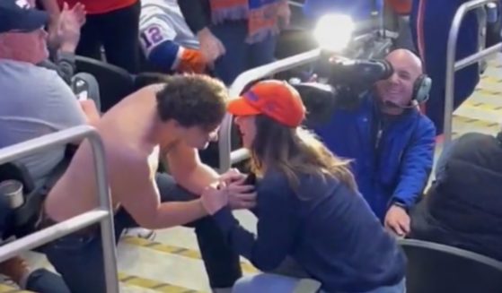 A man makes a marriage proposal to his girlfriend at the NHL game between the host New York Islanders and Florida Panthers on Thursday, but the man apparently wasn't a winner on this night.