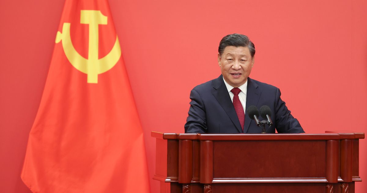 Chinese President Xi Jinping speaks at the podium during the meetingof the Standing Committee of the Chinese Communist Party's Politburo in Beijing on Sunday.