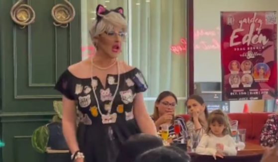 A drag queen performs in front of a young child in Plano, Texas, over the weekend.