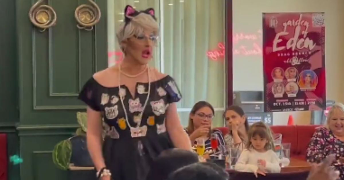 A drag queen performs in front of a young child in Plano, Texas, over the weekend.