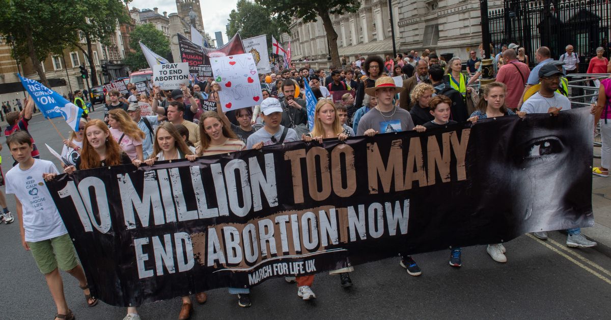 Participants in the anti-abortion 10 Million Lives Too Many march proceed up Whitehall on Sept. 3 in London.
