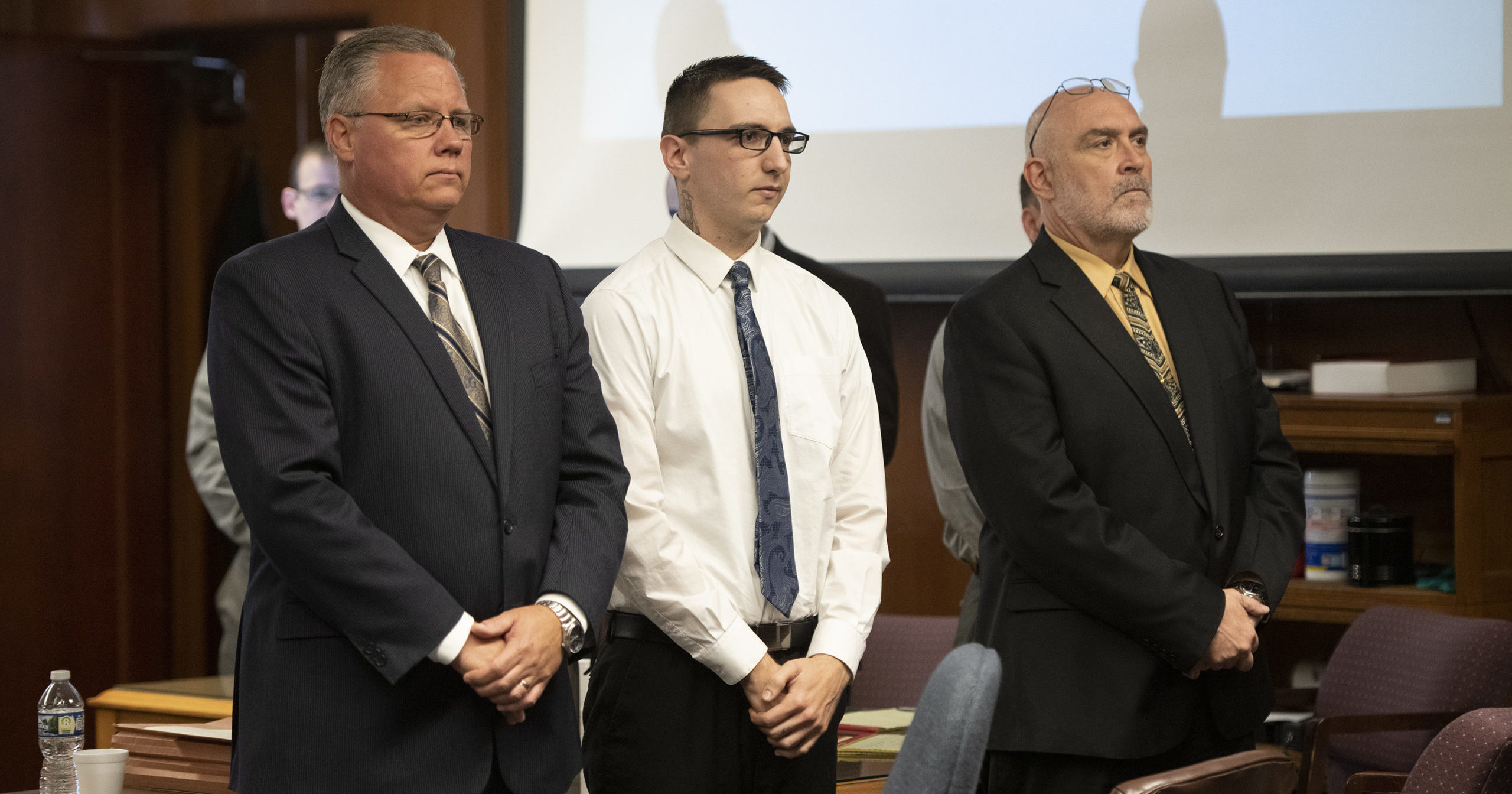 Paul Bellar, middle, appears before Jackson County Circuit Court Judge Thomas Wilson on Oct. 5 in Jackson, Michigan.