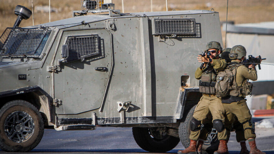 Israeli security forces conduct a search operation following a shooting attack in the West Bank village of Salem, near Nablus, on October 2, 2022. Photo by Nasser Ishtayeh/Flash90