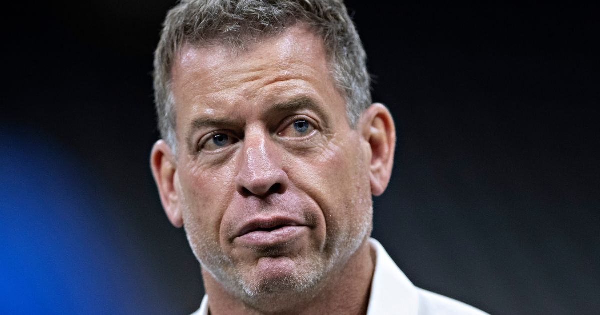 Troy Aikman on the field before a game between the Los Angeles Rams and the New Orleans Saints at Mercedes-Benz Superdome on Nov. 4, 2018, in New Orleans.