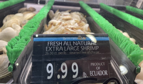 The price of shrimp is displayed at a market in Philadelphia in this file photo from June.