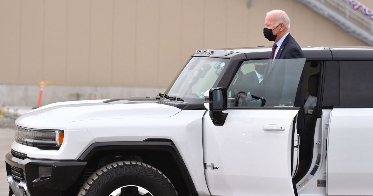 President Joe Biden test drives a GMC Hummer EV as he tours the General Motors Factory ZERO electric vehicle assembly plant in Detroit on Nov. 17, 2021.
