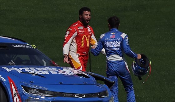 Bubba Wallace, driver of the #45 McDonald's Toyota, confronts Kyle Larson, driver of the #5 HendrickCars.com Chevrolet, after an on-track incident during the NASCAR Cup Series South Point 400 at Las Vegas Motor Speedway on Oct. 16 in Las Vegas.