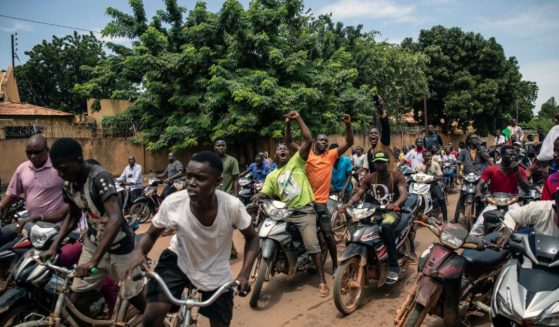 Young men chant slogans against the power of Lieutenant-Colonel Damiba, against France and pro-Russia, in Ouagadougou, Burkina Faso, on Friday.