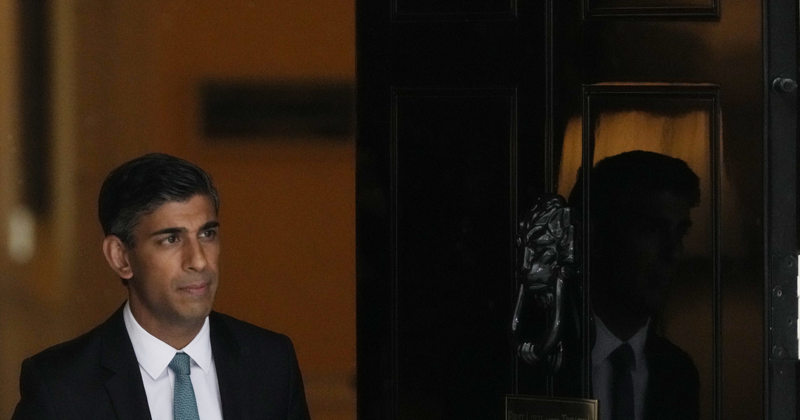 British Prime Minister Rishi Sunak leaves 10 Downing St. for the House of Commons for his first Prime Minister's Questions in London on Wednesday.