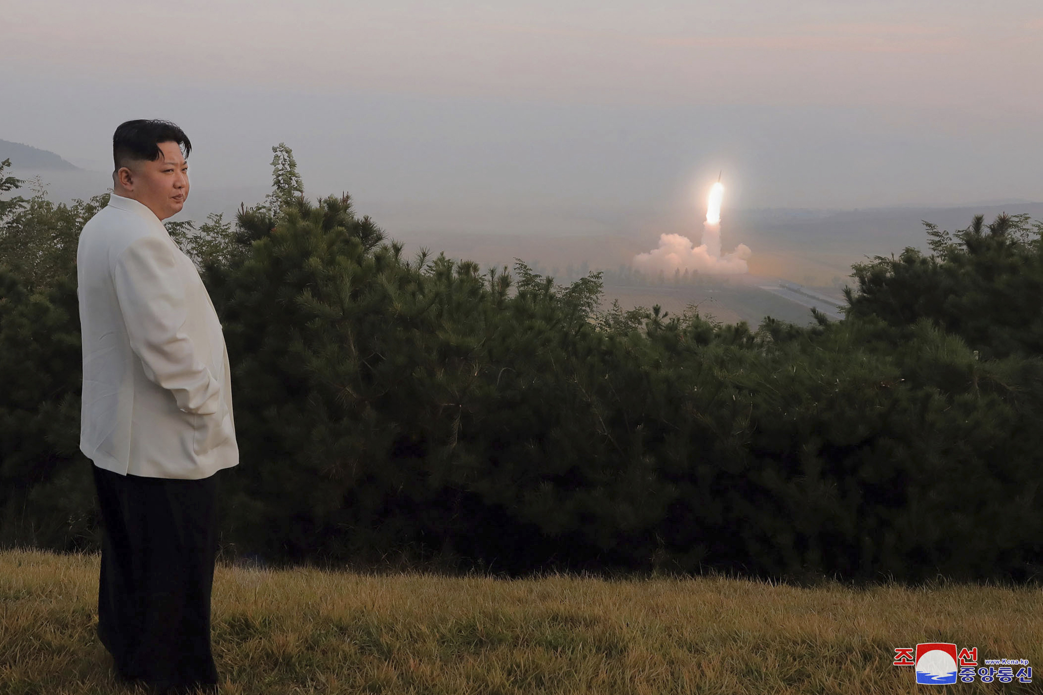 North Korean dictator Kim Jong Un watches a missile test in a photo released Monday.