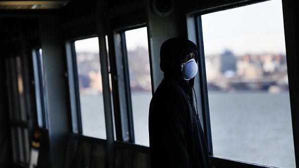 Tremaine Fredericks rides on an empty Staten Island Ferry to Manhattan on March 24, 2020 in New York City. (Photo by Spencer Platt/Getty Images)