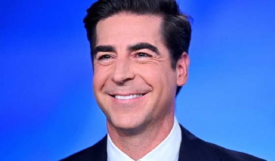 Fox News personality Jesse Watters grins in a file photo.