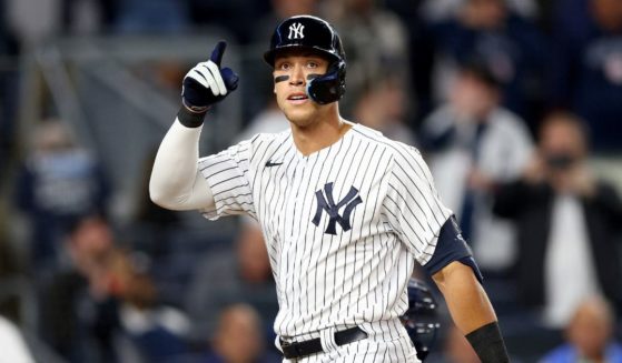 Aaron Judge of the New York Yankees celebrates his solo home run in the fifth inning against the Cleveland Guardians at Yankee Stadium on April 22 in the Bronx borough of New York City.