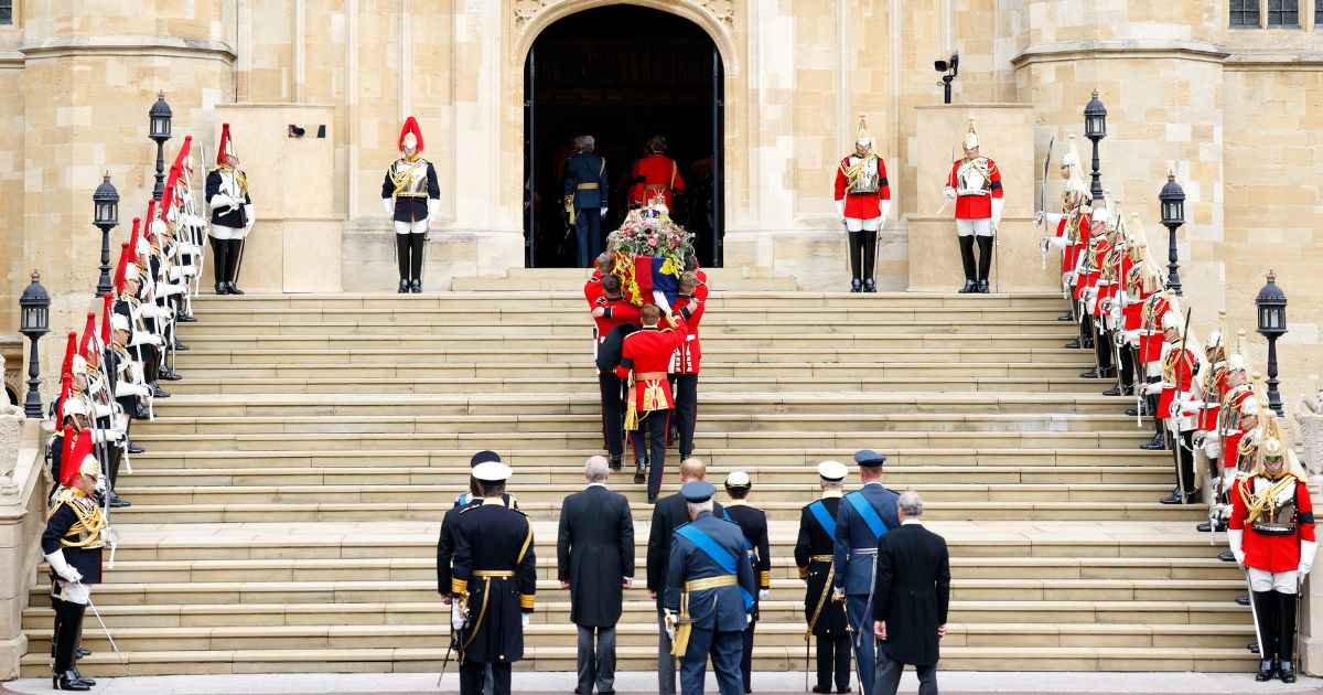 Pallbearers carry Queen Elizabeth II's coffin into St George's Chapel for her committal service on Sept. 19 in Windsor, England.